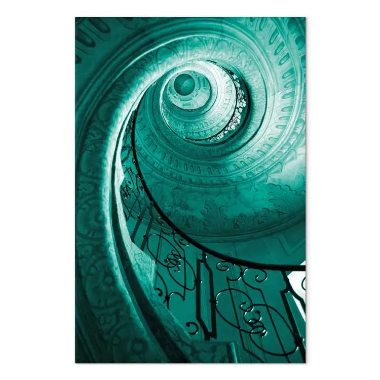 Spiraltrappa - fotografi av en trappa i turkos