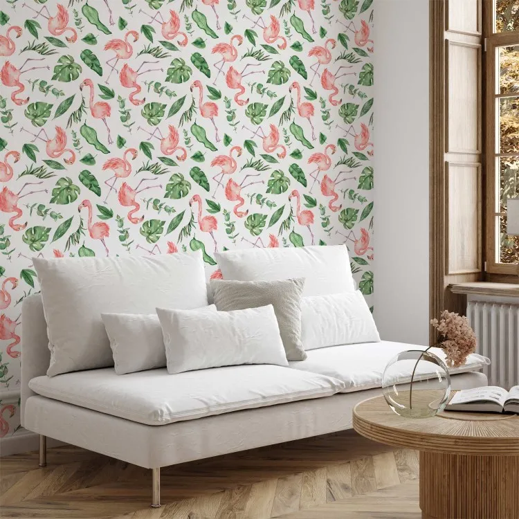 Exotiskt mönster - rosa flamingos och gröna blad på vit bakgrund
