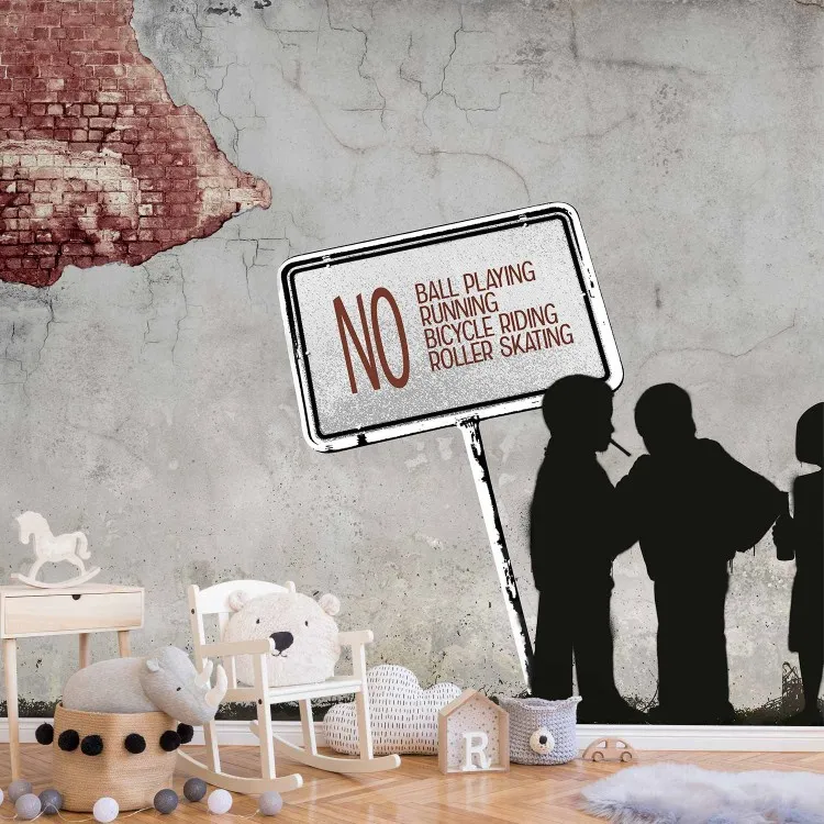 Ingen bollspel... - street art i Banksy-stil med texter på betong